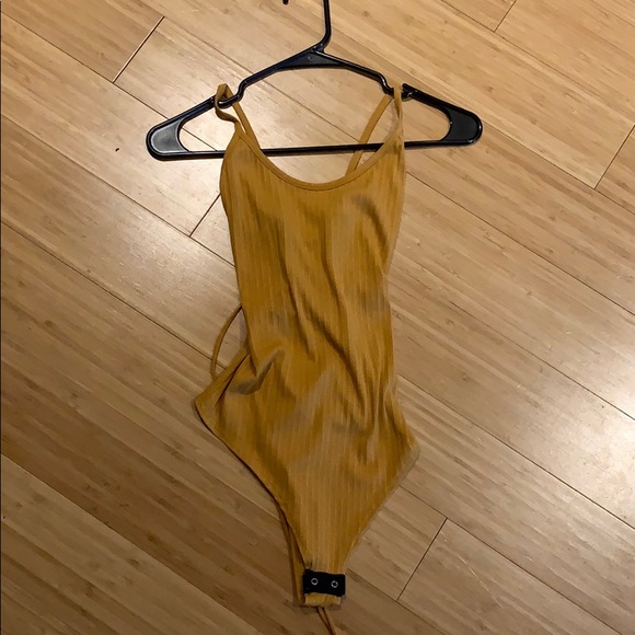 Mustard body suit size medium. - Picture 2 of 3